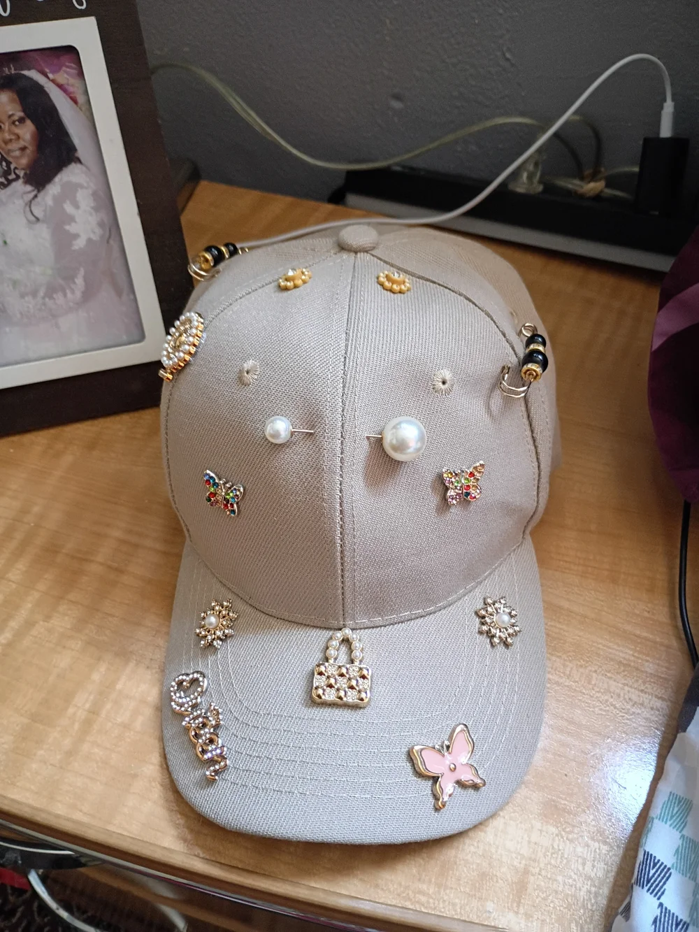 Embellished Beige Baseball Cap with Pearl & Charm Accents